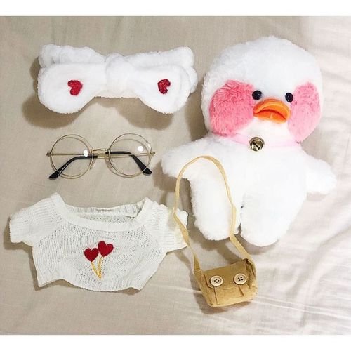 Canard en peluche blanc, personnage de dessin animé